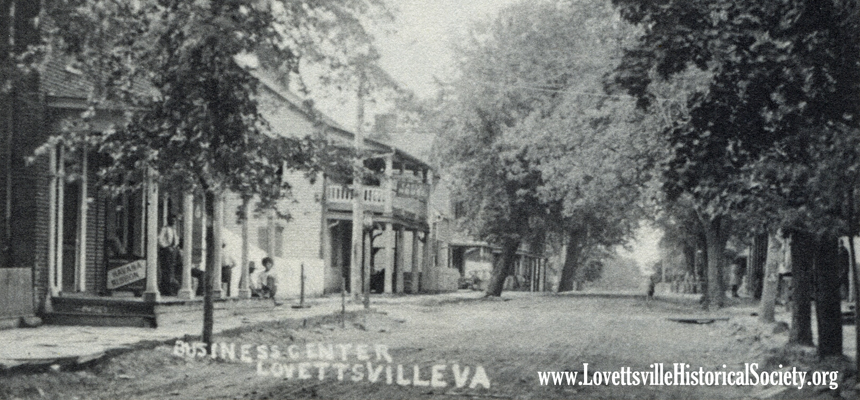 The building at center with the balcony was the old Lovettsville hotel and tavern which was probably built shortly after the town was laid out in 1820.  Among others, the building was acquired by Daniel Everhart in 1832, by John Snoots in 1847,  and by Jacob Snoots in 1856, according to Loudoun County land records.