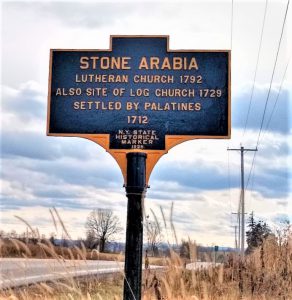 Historic marker near Trinity Lutheran Church, which reads: “Stone Arabia. Lutheran Church 1792. Also site of log church 1729. Settled by Palatines 1712.”